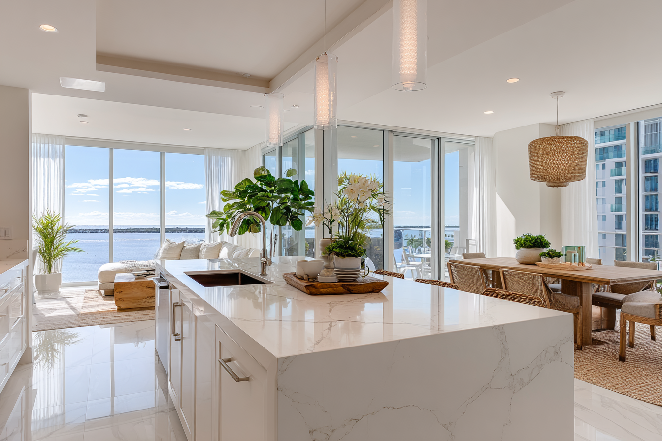 Contemporary West Palm Beach living room with white quartz details and sleek luxury finishes.