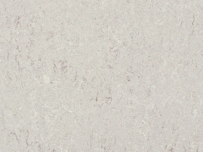 Caesarstone Bianco Drift quartz swatch: glossy white background with light brown and gray swirls