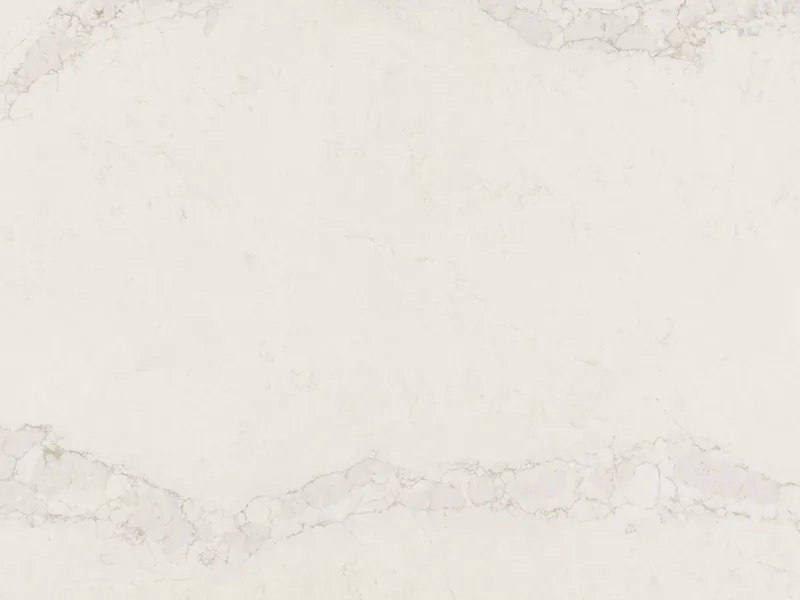 Caesarstone Calacatta Stillstorm quartz swatch: bright white background with bold pale gray and white veins