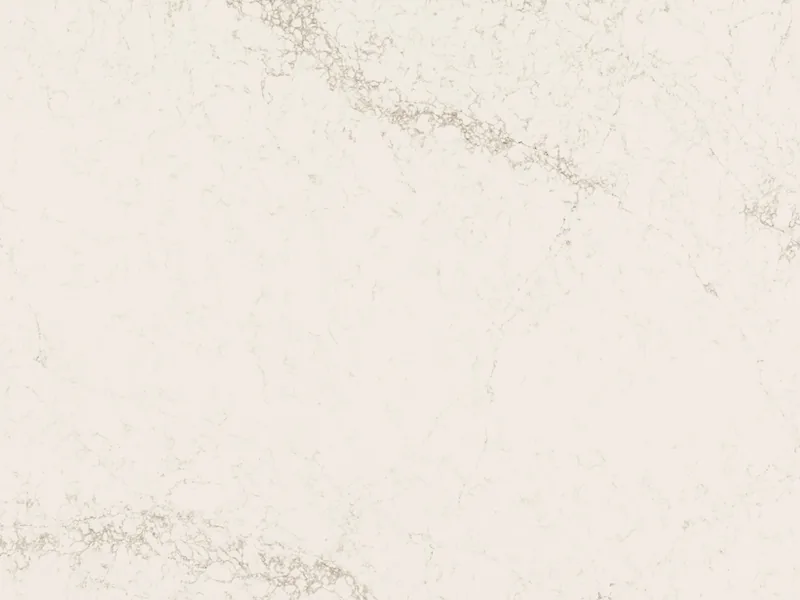 Caesarstone Celestial Sky quartz swatch: creamy white background with a web of gray and brown veins