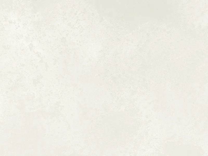 Caesarstone Cloudburst Concrete quartz swatch: creamy white concrete-look surface with pure white swells