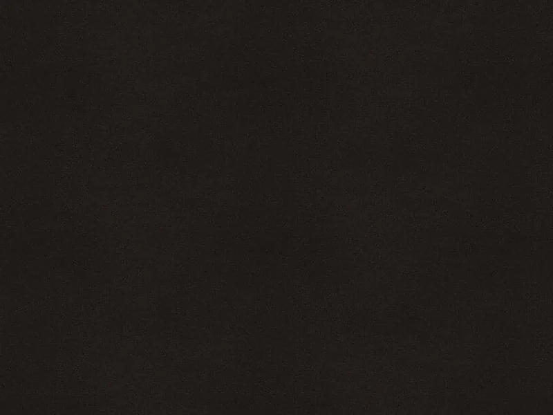 Caesarstone Jet Black quartz swatch: deep black surface with a subtle pattern