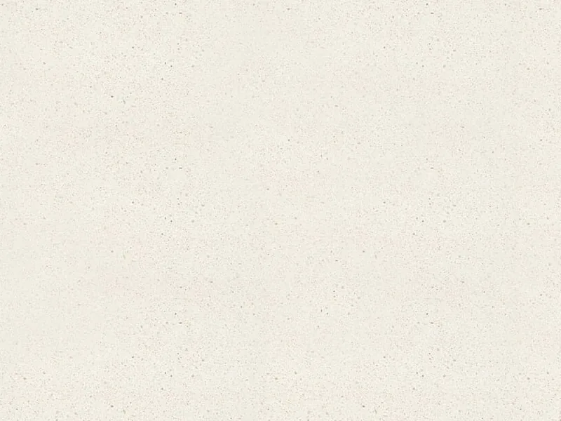 Caesarstone Nougat quartz swatch: white background with coarse beige and gray chips