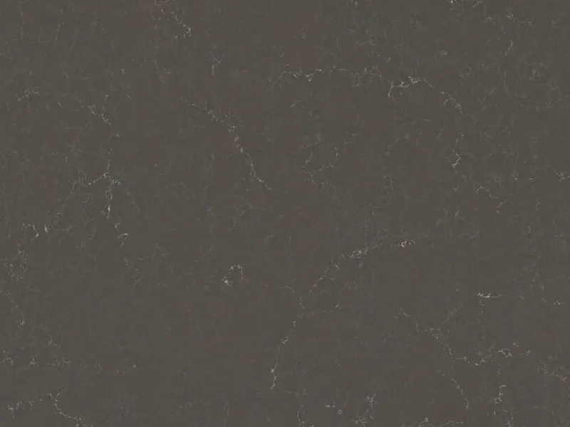 Caesarstone Piatra Grey quartz swatch: dark slate gray background with chalky white veins