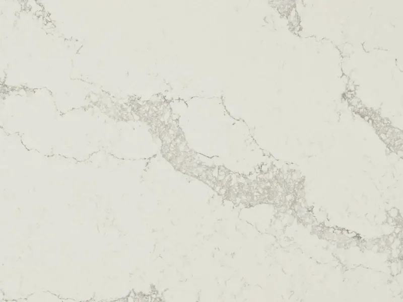 Caesarstone Statuario Maximus quartz swatch: dove-white background with broad light gray veins