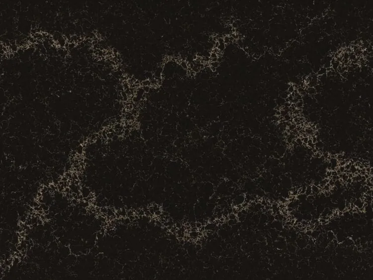 Caesarstone Vanilla Noir quartz swatch: ebony background with creamy vanilla veins