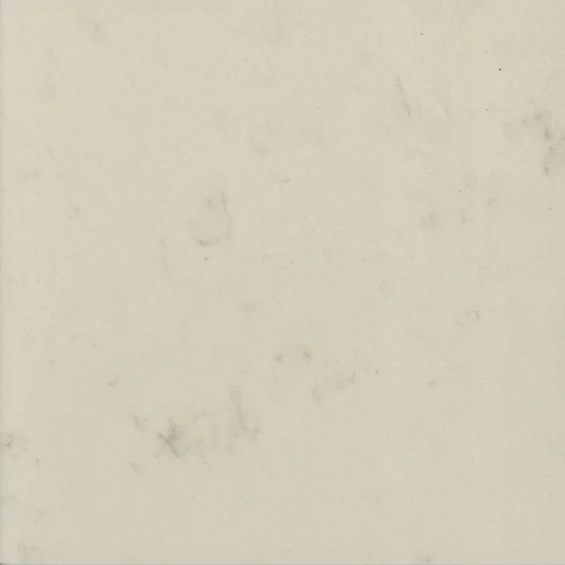 Corian Quartz Arabesque Perla quartz swatch: cream granite-look surface with subtle veining