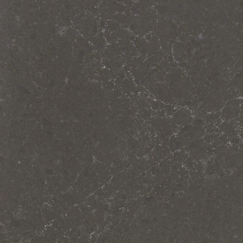 Corian Quartz Ironstone quartz swatch: gray stone-look surface with subtle veining
