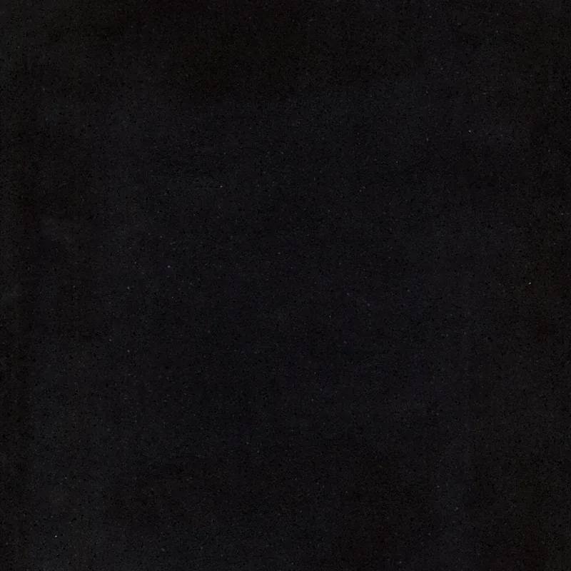 Corian Quartz Tahitian Sand quartz swatch: black solid surface with no veining