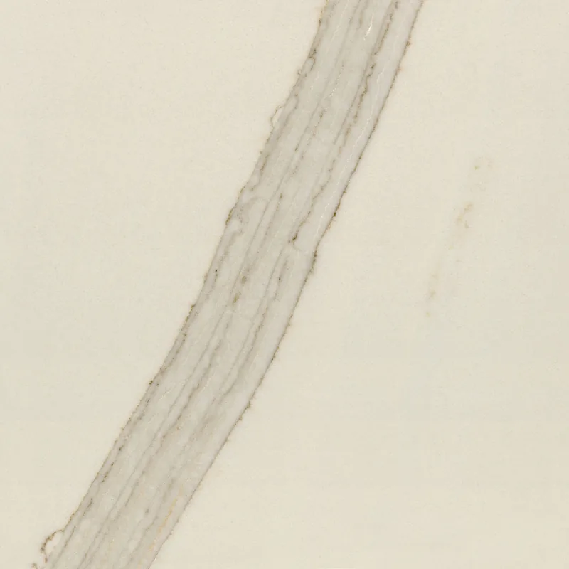 Corian Quartz Valente Pearl quartz swatch: cream marble-look surface with bold veining