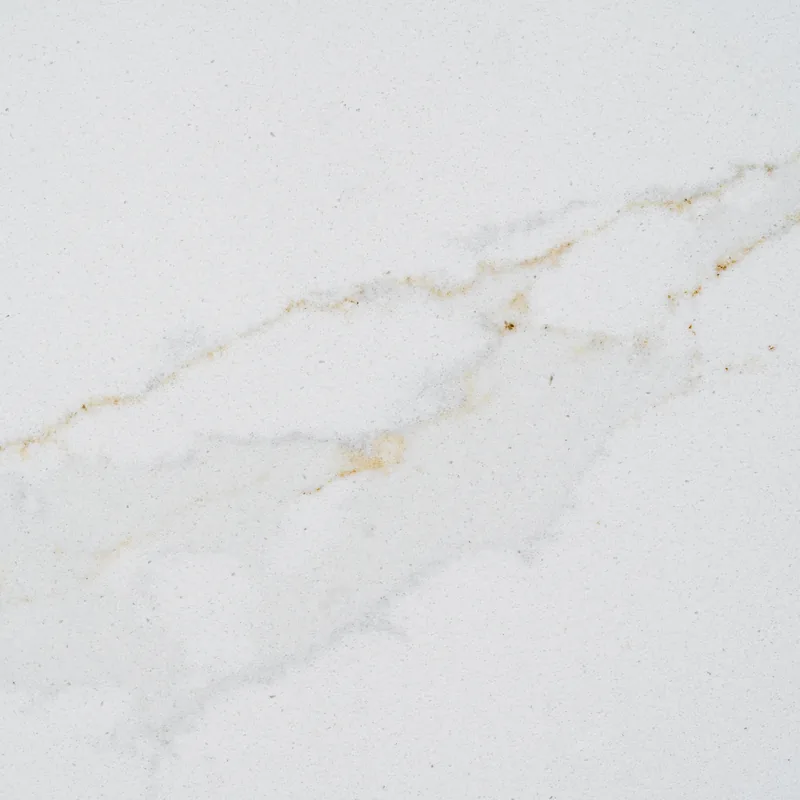 HanStone Quartz Aurelia swatch: white background with thin gold veins