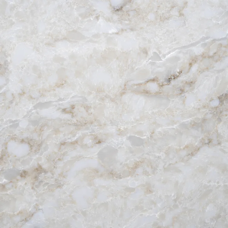 HanStone Quartz Avora swatch: warm cream background with layered gold and sand movement
