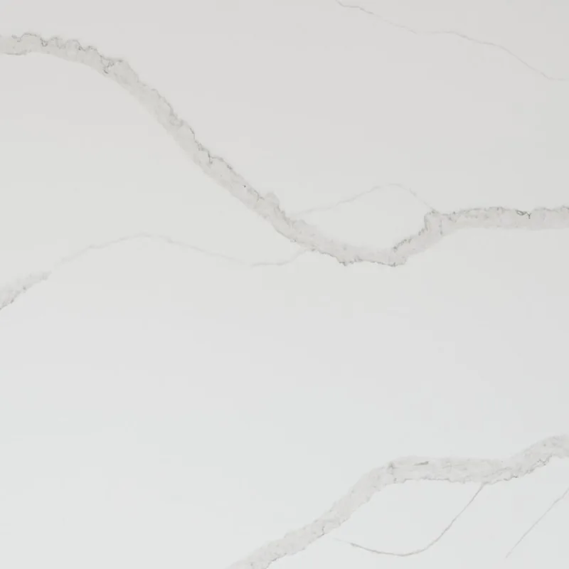HanStone Quartz Calacatta Gold swatch: solid white background with sweeping wide veins