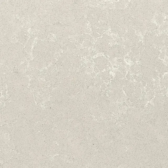 HanStone Quartz Coast swatch: warm greige background with soft movement and a textured finish
