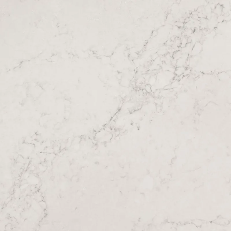 HanStone Quartz Montauk swatch: pearl white background with sandy dappling and fine grey veins