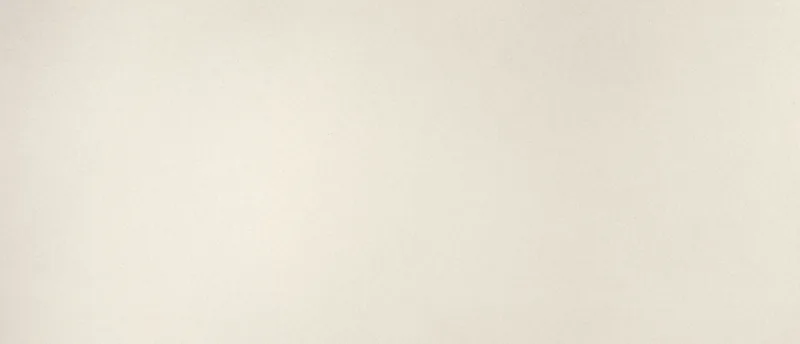 MSI Q Quartz Aruca White quartz slab: warm white background with fine sand-like grains