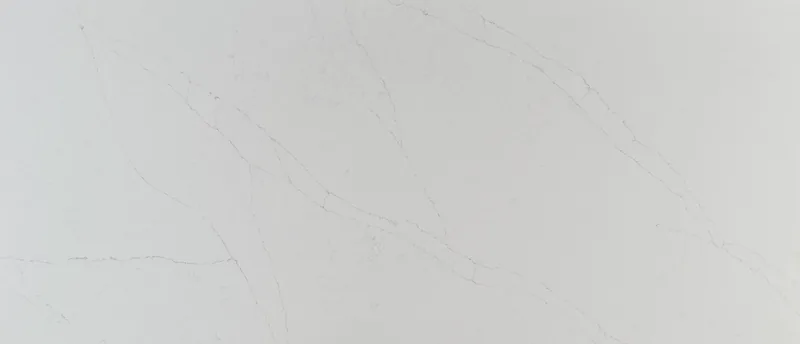 MSI Q Quartz Calacatta Alto quartz slab: cool white background with thin, sparse light gray veins