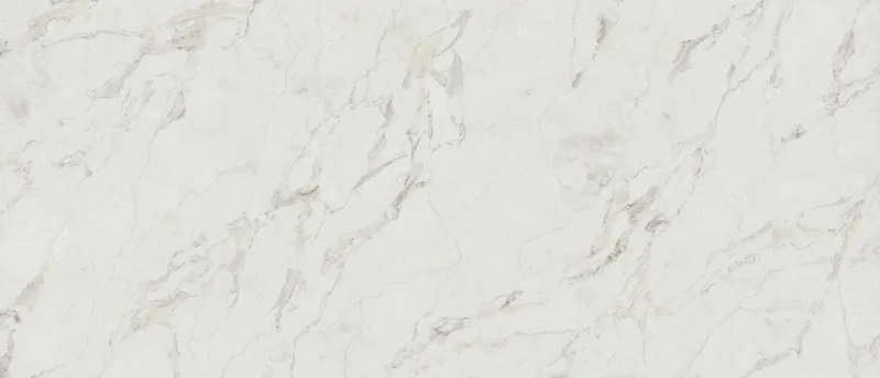 MSI Q Quartz Calacatta Aravine quartz slab: warm off-white base with sweeping chocolate and blonde veins
