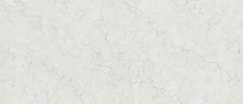 MSI Q Quartz Calacatta Azulean quartz slab: warm white base with blue, blonde and gold cracked veining