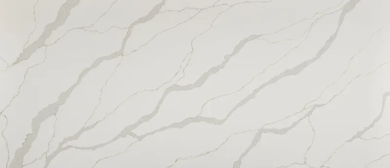 MSI Q Quartz Calacatta Idillio quartz slab: white base with thick gray veins edged in warm brown
