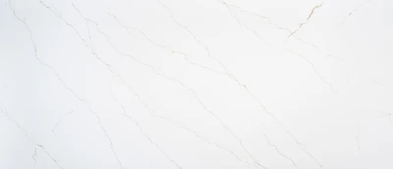 MSI Q Quartz Calacatta Miraggio Gold quartz slab: crisp white background with diagonal golden brown veins