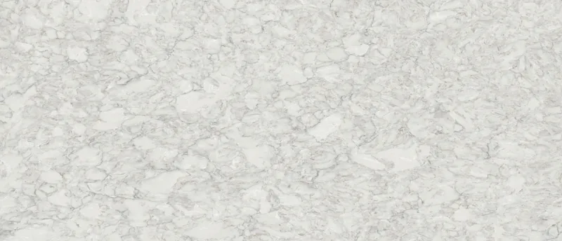 MSI Q Quartz Calacatta Ocellio quartz slab: white background with charcoal crack-like veins and warm gold accents