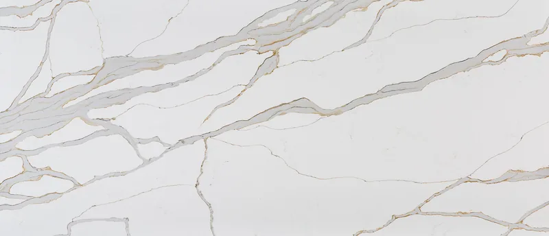 MSI Q Quartz Calacatta Solessio quartz slab: bright white background with thick blue-gray veins edged in rust