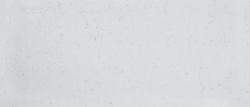 MSI Q Quartz Carrara Breve quartz slab: warm white background with short gold and brown vein strokes