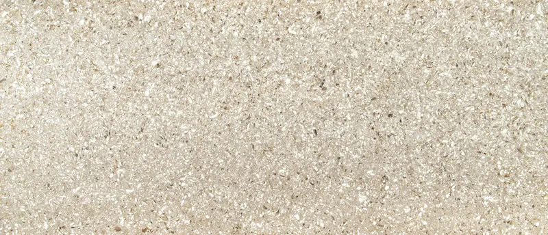 MSI Q Quartz Chakra Beige quartz slab: beige granite-look surface with dense cream, gray and rust flecks