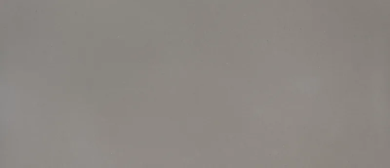 MSI Q Quartz Fossil Gray quartz slab: even mid-gray limestone-look surface with faint specks