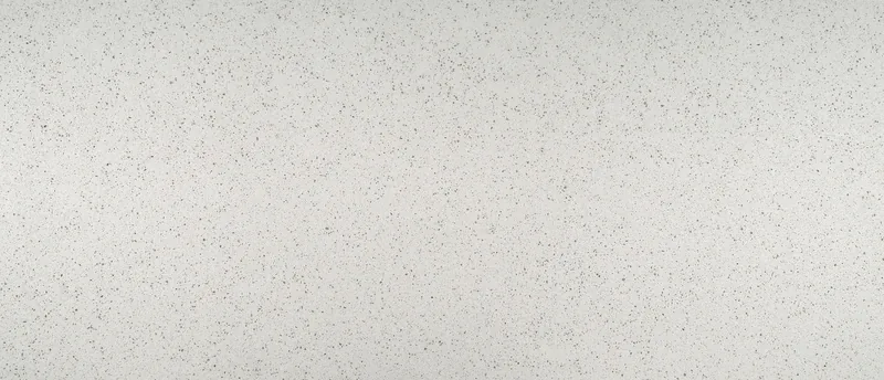 MSI Q Quartz Iced White quartz slab: snowy white background with small evenly spread gray specks