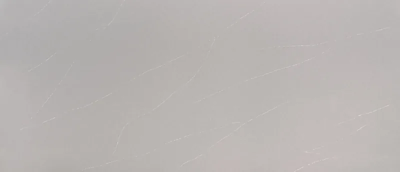 MSI Q Quartz Soapstone Mist quartz slab: dove-gray background with long faint white veins