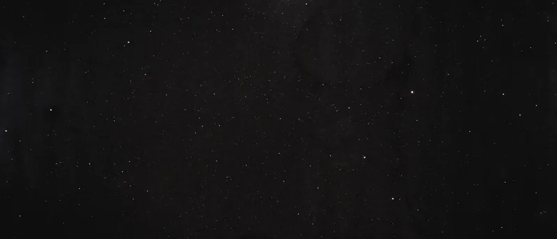 MSI Q Quartz Sparkling Black quartz slab: deep black background with reflective sparkling particles