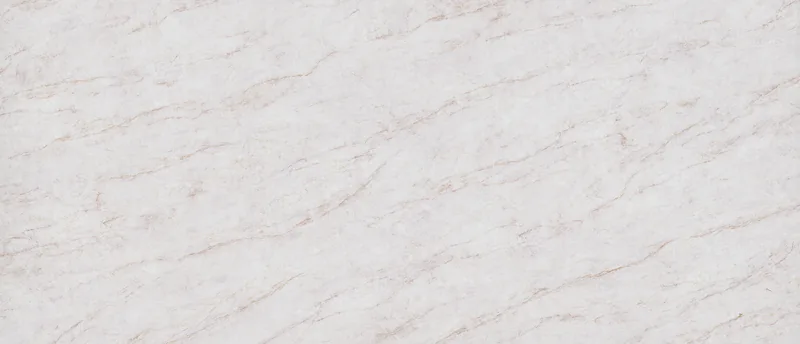 MSI Q Quartz VelaTaj quartz slab: bright white background with sweeping warm gold veins