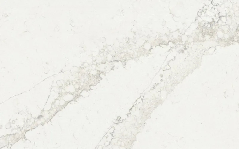 Silestone Calacatta Themis countertop swatch: off-white background with bold black and gray veining