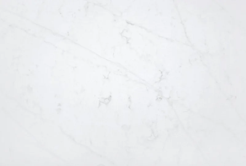 Silestone Eternal Statuario countertop swatch: white background with very soft gray veins