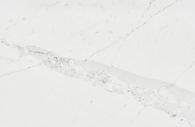 Silestone Ethereal Indigo countertop swatch: white background with a wide gray vein band and blue-gray flecks