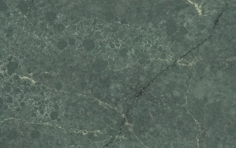 Silestone Jardin Emerald countertop swatch: deep green background with golden and black veins