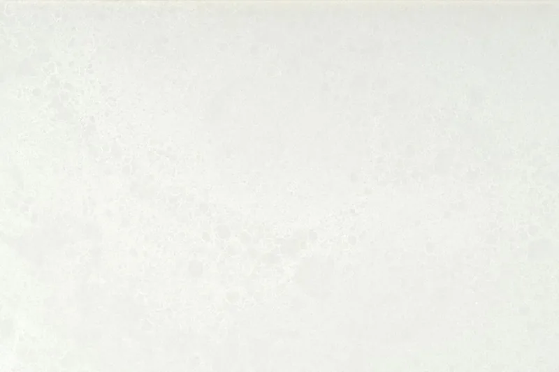 Silestone Nolita countertop swatch: light white-gray concrete-look surface