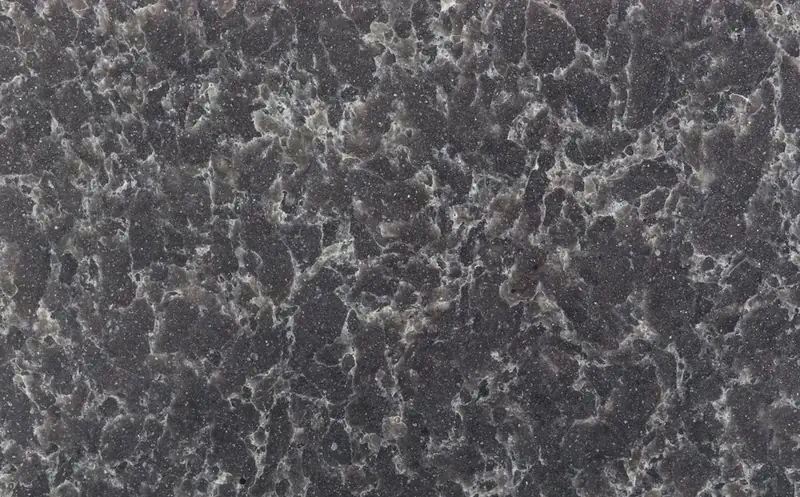 Silestone Ocean Storm countertop swatch: dark gray background with lighter mottled network