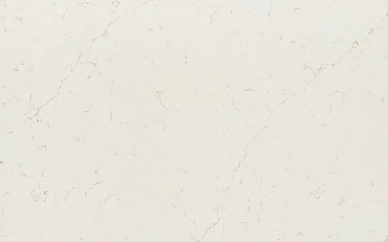 Silestone Persian White countertop swatch: warm white background with a network of fine creamy veins