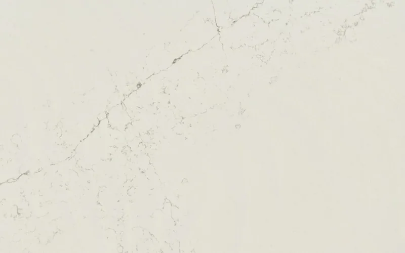Silestone Siberian countertop swatch: soft white background with thin warm and gray veins