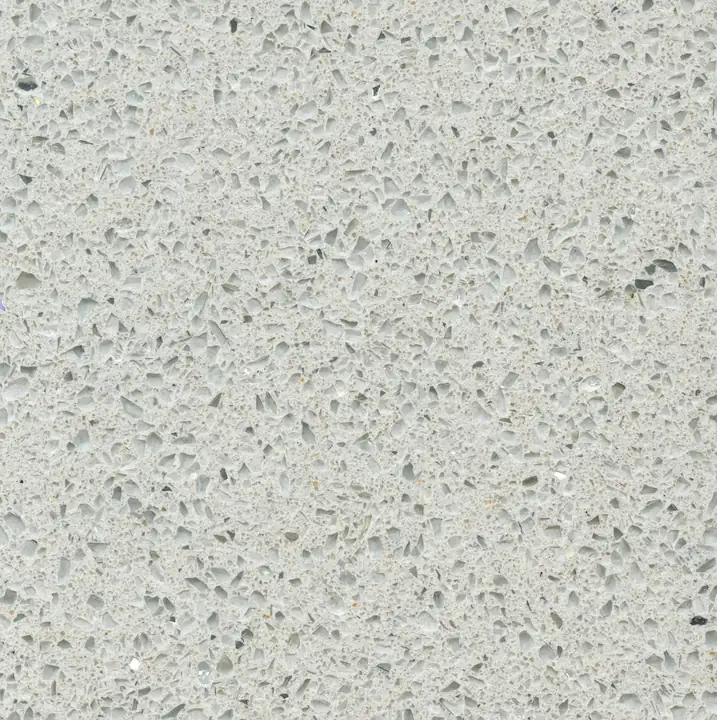 Silestone Stellar Snow countertop swatch: light gray-white background with glassy chips