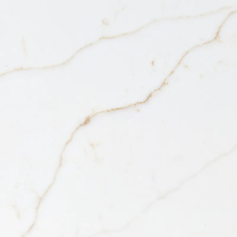 Viatera Delicato quartz swatch: off-white background with gold and grey veins that fade in and out