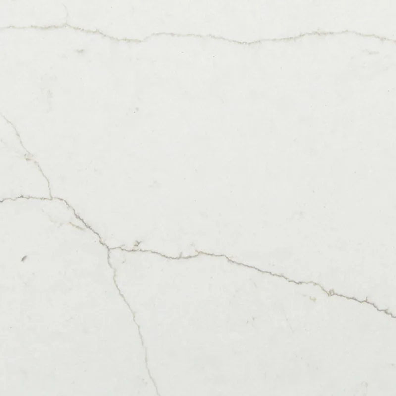 Viatera Macaubas Bianco quartz swatch: off-white background with long horizontal gold and grey veins