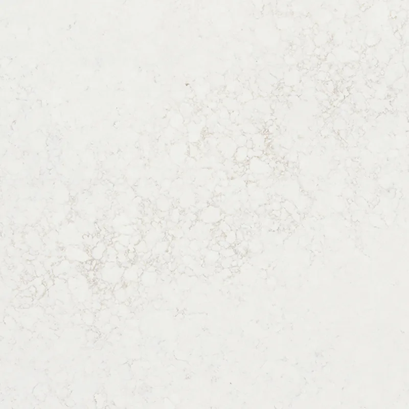Viatera Nebulo quartz swatch: ivory background with soft taupe and honey marbling
