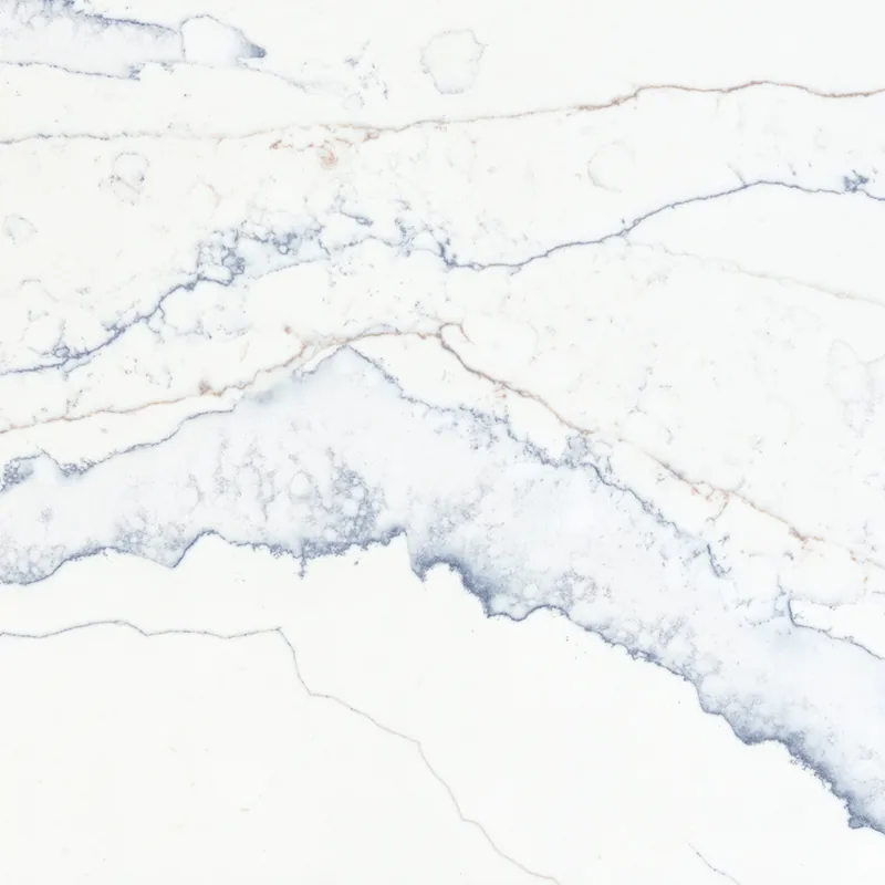 Viatera Ocean Ridge quartz swatch: off-white background with fine navy veins and shadowy waves