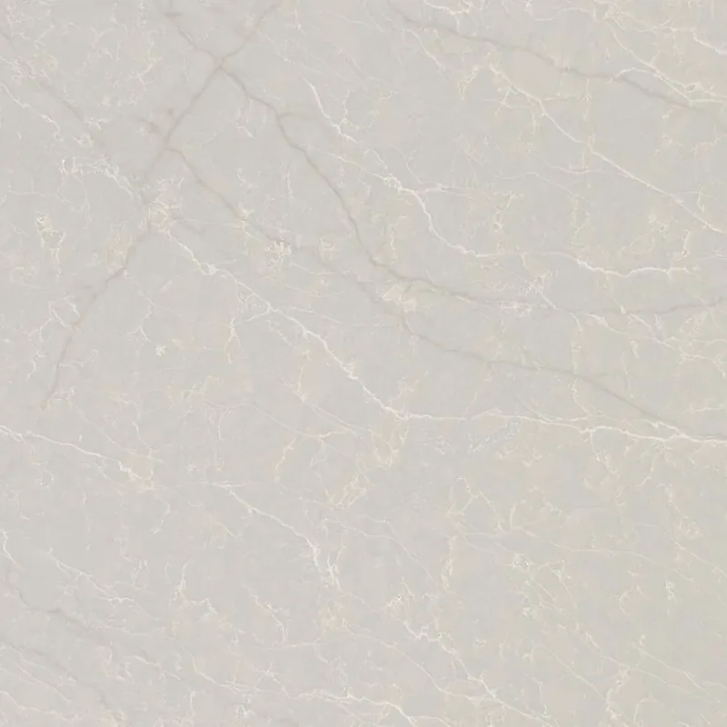Viatera Taj Crema quartz swatch: warm cream background with white and gold veins