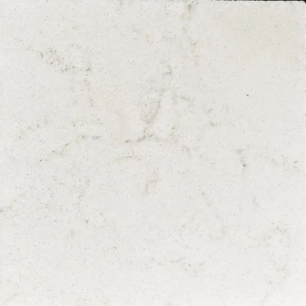 Viatera White Dove quartz swatch: off-white background with fine speckles and short light grey veins