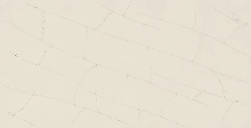 Wilsonart Capogrossi quartz swatch: cream marble-look surface with moderate veining